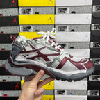 Balenciaga unisex sneakers front-left view, silver upper with burgundy stripes and white laces