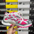 Side view chunky lace-up running sneakers with hot pink, white, and gray mesh