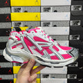 Chunky lace-up running sneakers with white, hot pink, and gray mesh panels