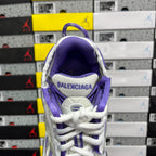 Purple interior collar and white lace-up sneaker tongue with BALENCIAGA.