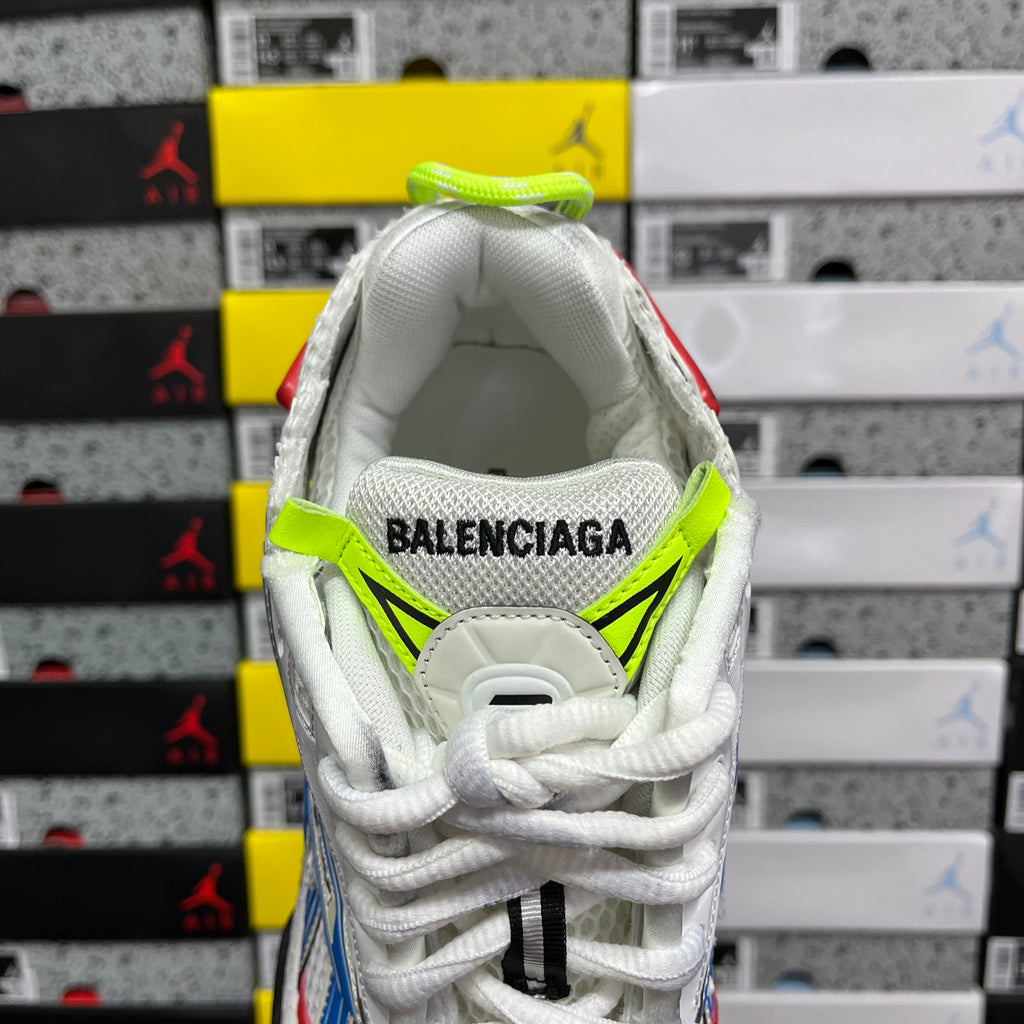 Unisex sneaker interior with green collar trim and BALENCIAGA logo on the tongue