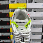 Unisex sneaker interior with green collar trim and BALENCIAGA logo on the tongue