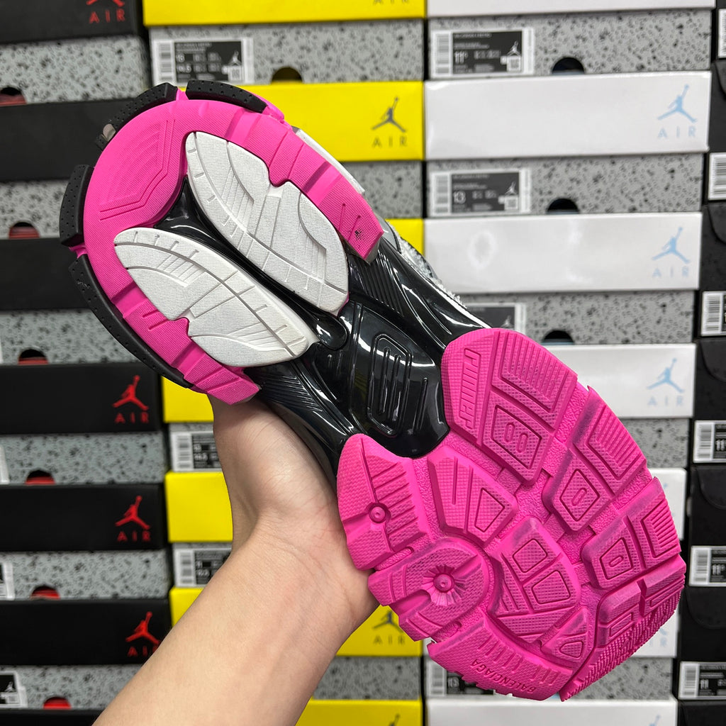 Balenciaga unisex sneakers, outsole view with pink traction tread and black midfoot