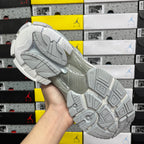Light silver/white sneaker outsole with geometric tread pattern