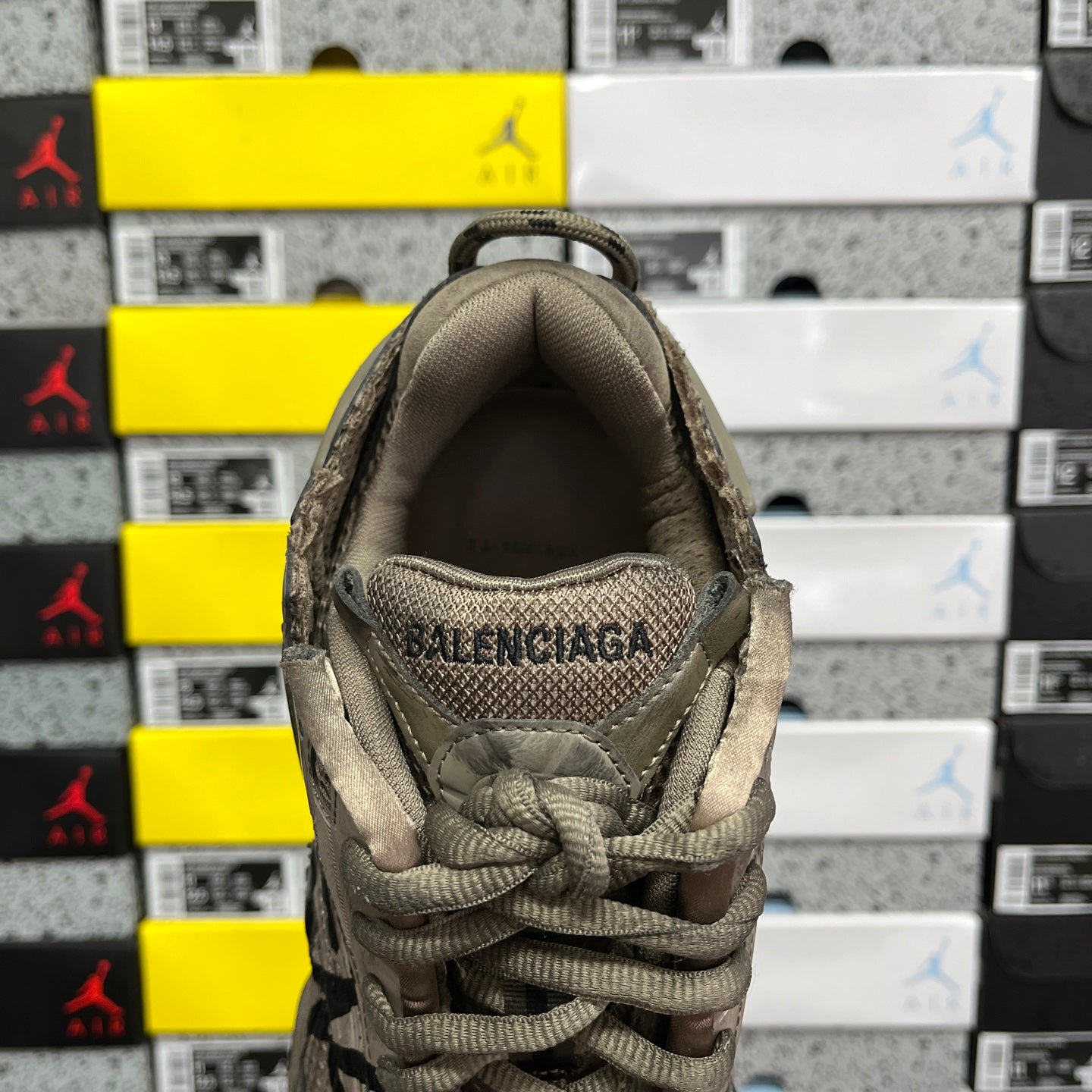 Balenciaga unisex sneakers back view with “BALENCIAGA” on heel collar lining
