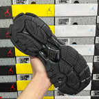 Black Balenciaga running sneaker outsole with deep tread pattern