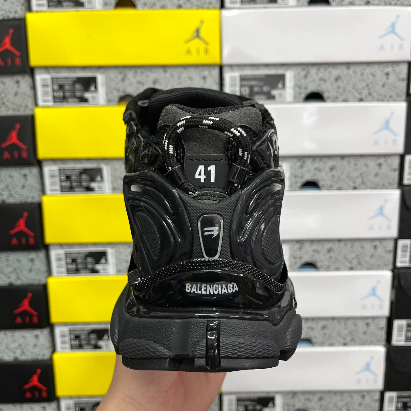 Black Balenciaga running sneaker back view with “41” size marking and BALENCIAGA logo