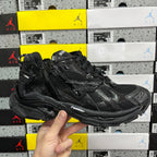 Black Balenciaga running sneaker with textured upper and black laces