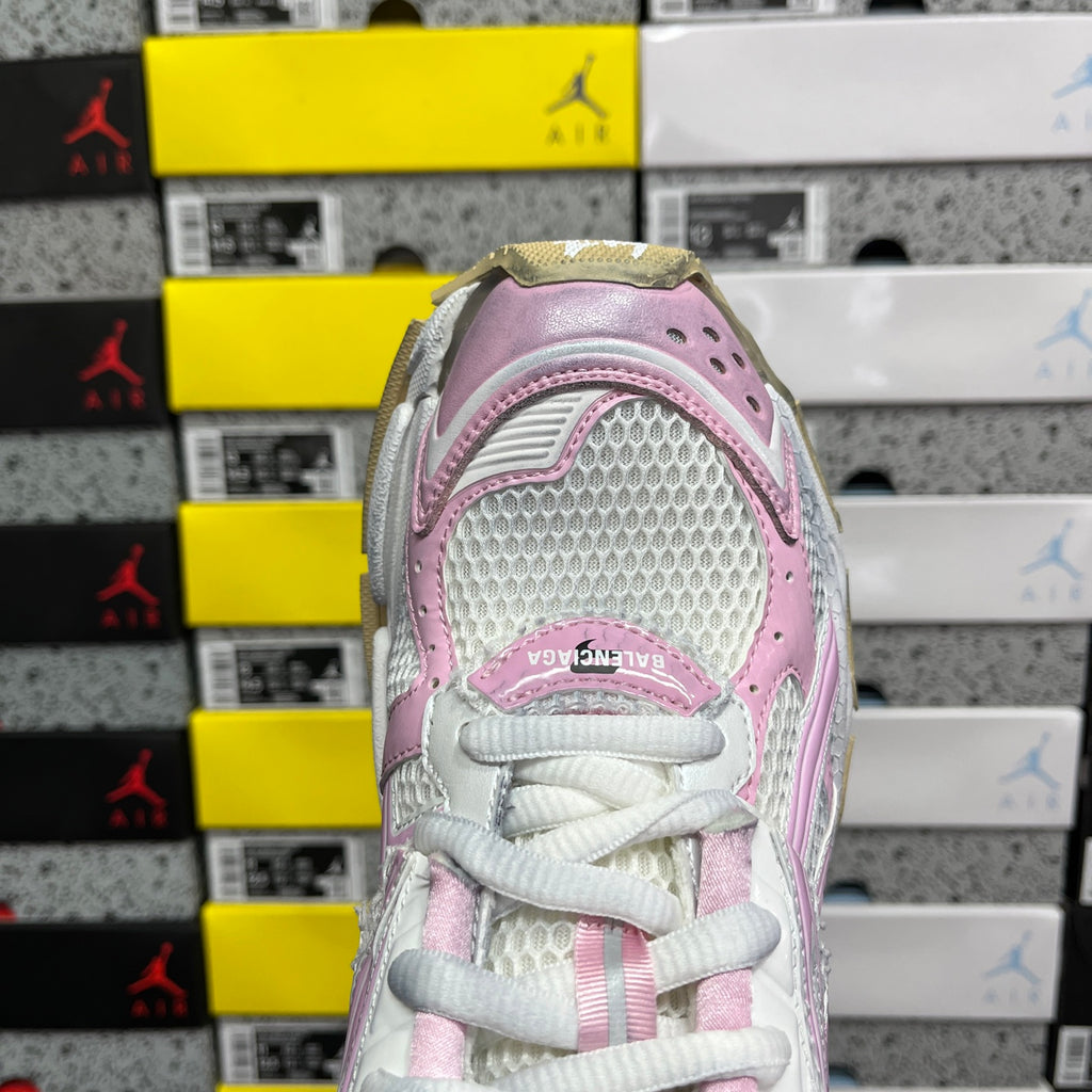 White and pink lace-up sneaker with mesh toe panel and padded collar