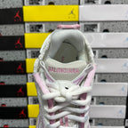 White sneaker heel with pink trim, lace-up closure, and Balenciaga logo label