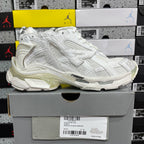 White Balenciaga unisex sneakers, side view with chunky sole and mesh panels