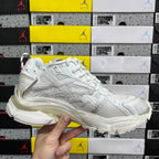 White Balenciaga unisex sneakers, front side view with lace-up upper and chunky midsole