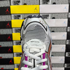 Silver perforated mesh sneaker toe with white laces and purple collar trim