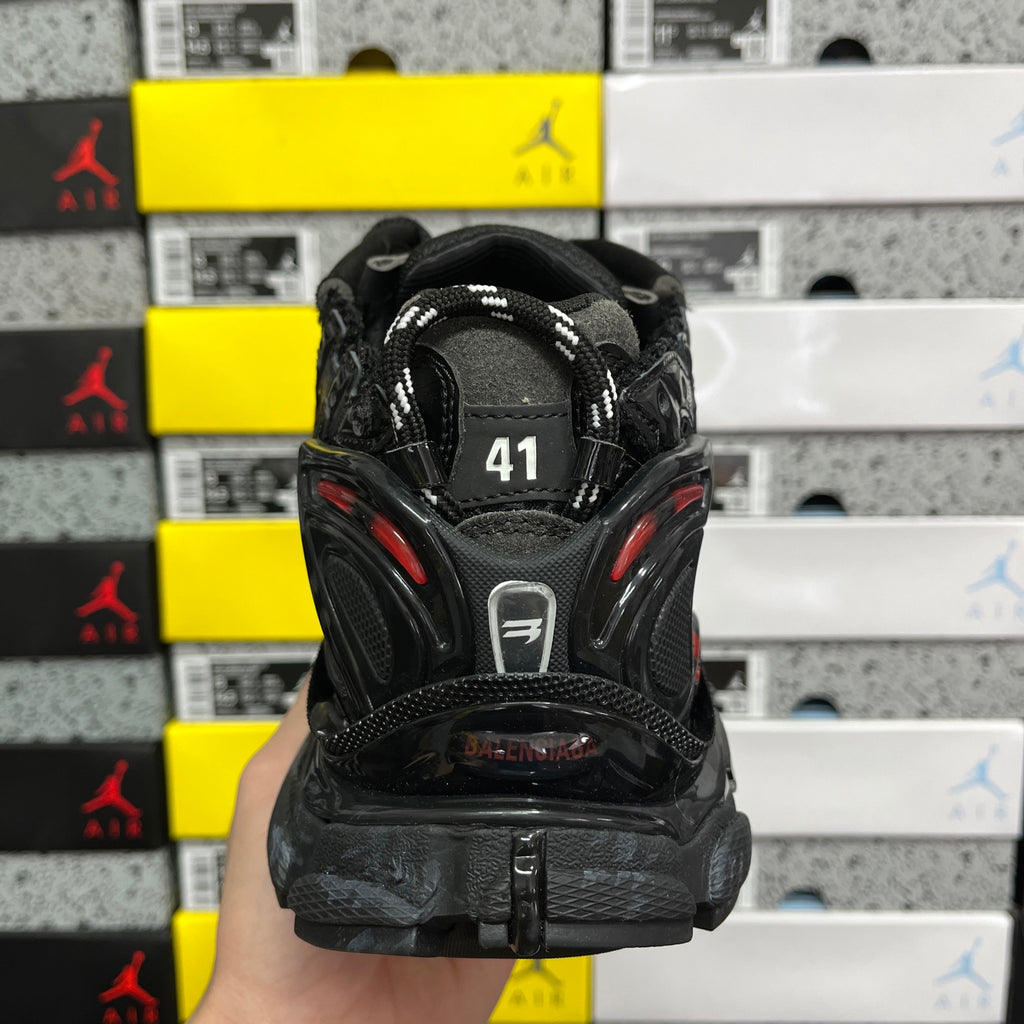Black Balenciaga runner sneaker, rear view with size tag 41