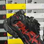 Black and red Balenciaga runner sneaker, lateral view with chunky sole