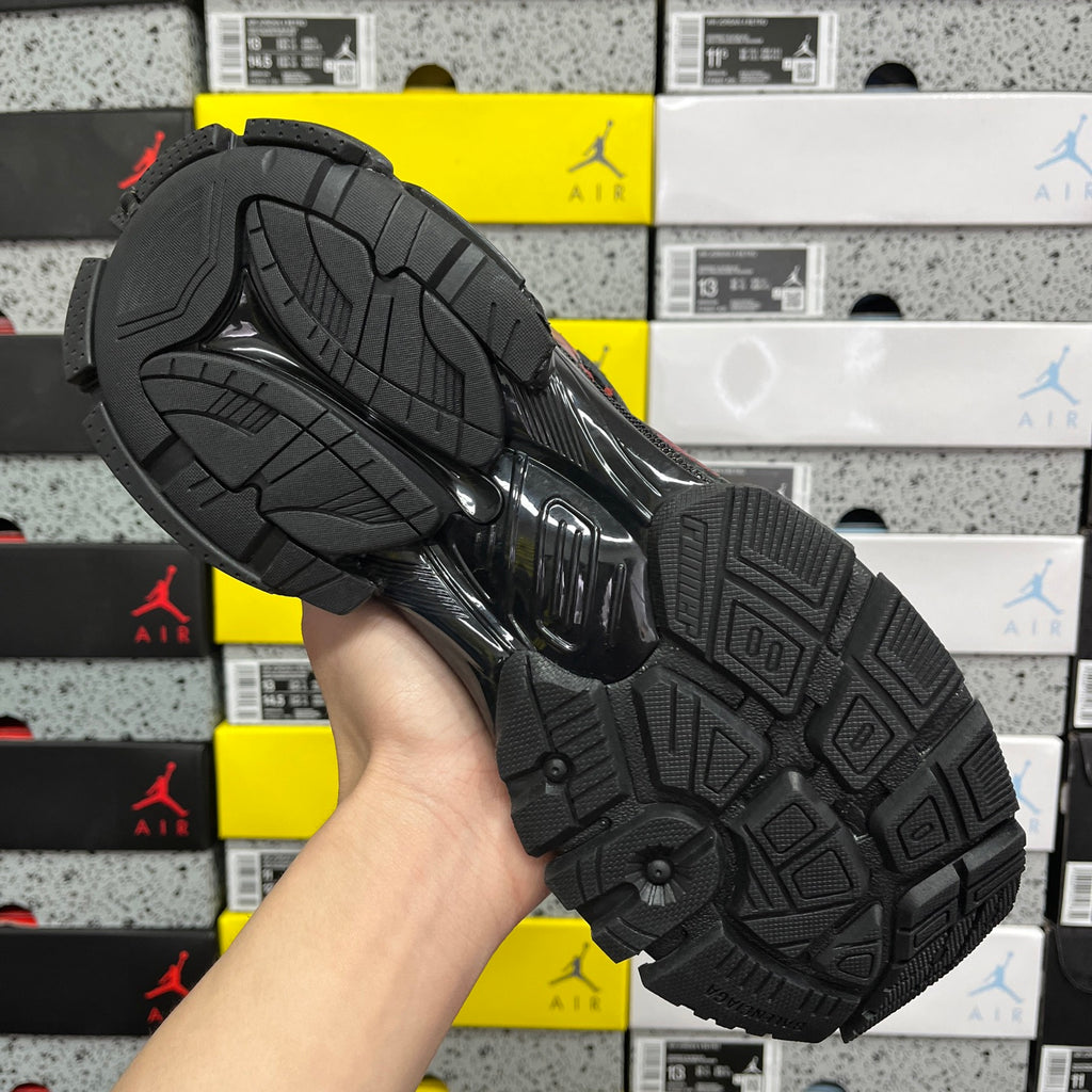 Black Balenciaga runner sneaker outsole, tread pattern and sidewall detail