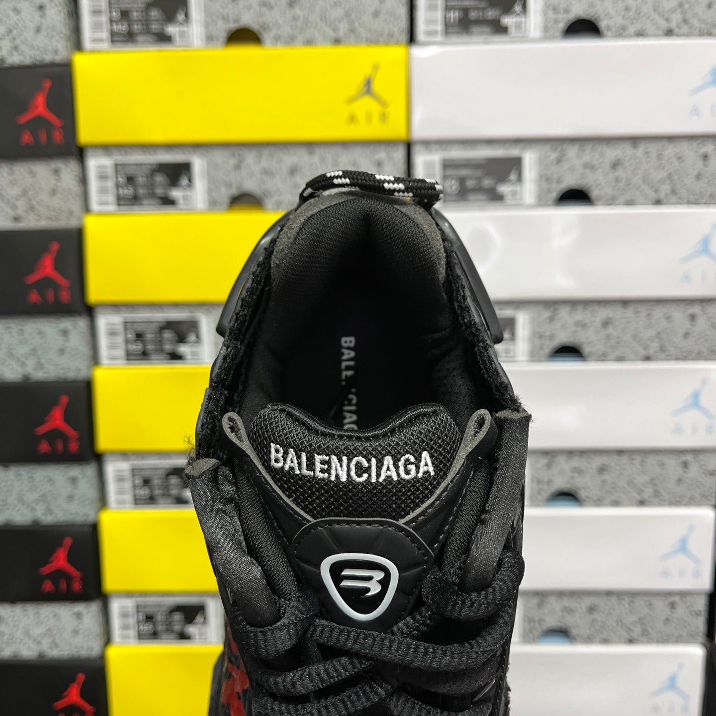 Black Balenciaga runner sneaker heel, fabric pull tab with BALENCIAGA logo