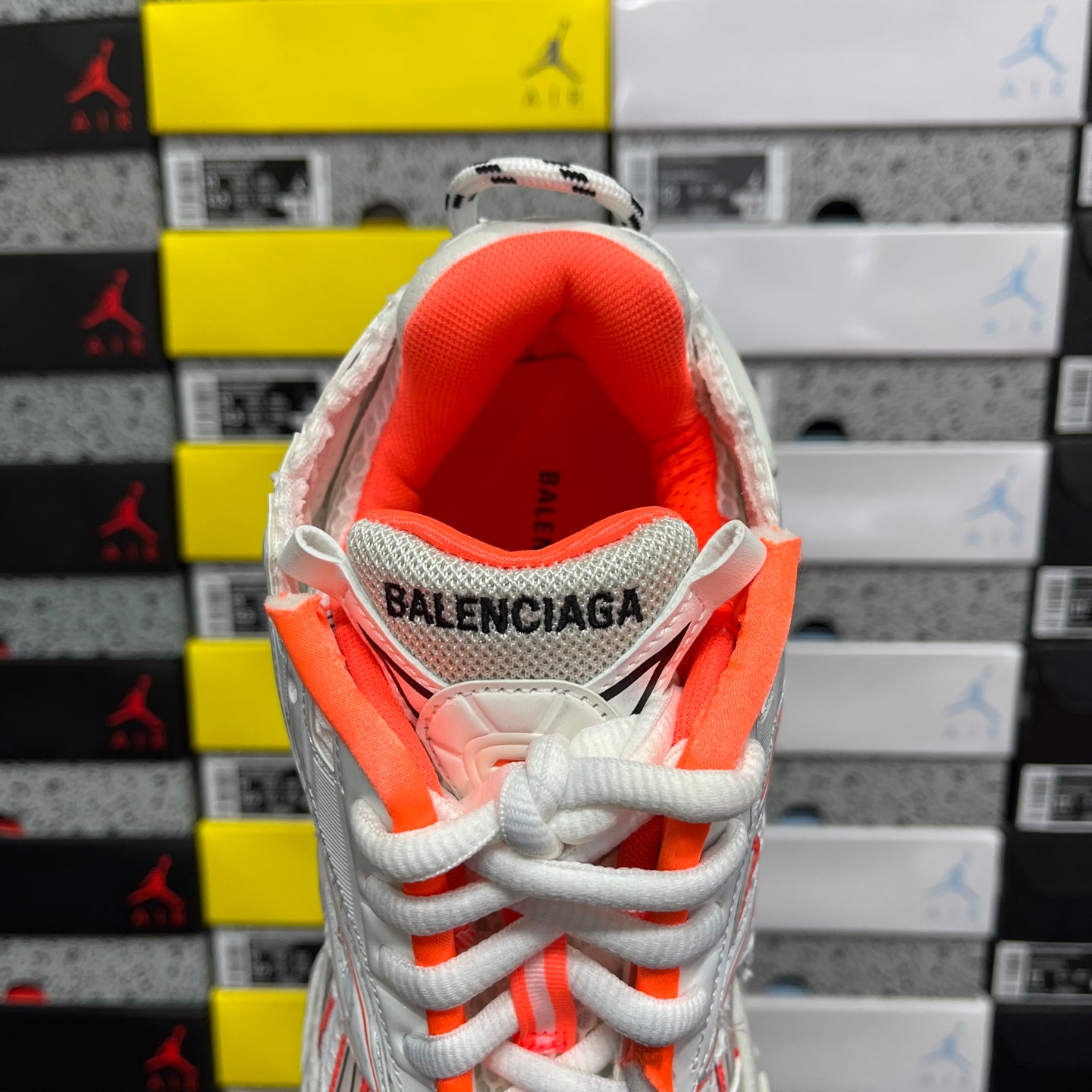 Balenciaga runner sneakers tongue opening, white collar with orange lining and logo