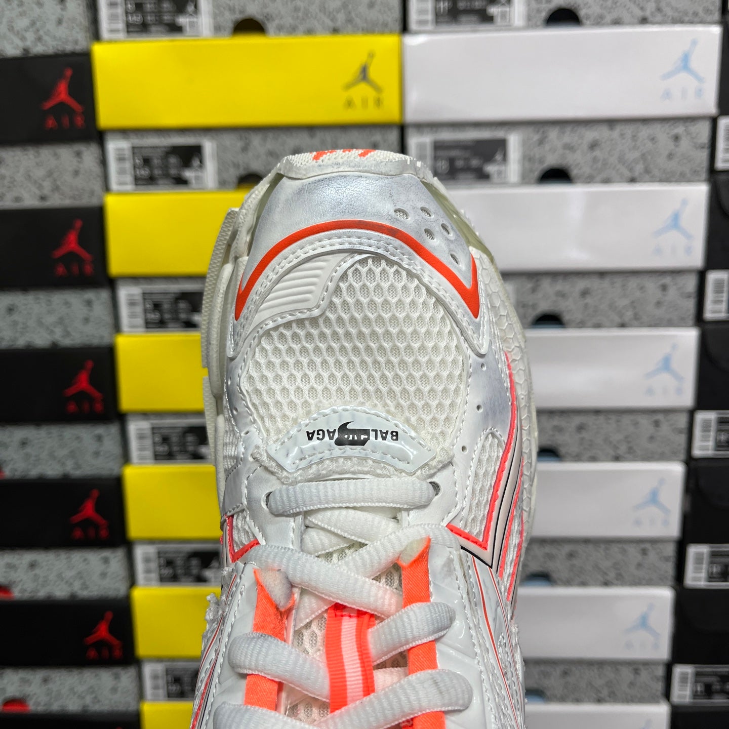 Balenciaga runner sneakers heel, white back panel with orange piping and mesh texture