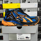 High-top unisex sneakers, blue upper with black trims and orange midsole