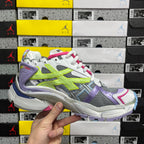 Balenciaga unisex sneakers front angle, multicolor mesh with neon green and purple side panels