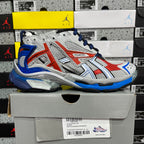 Unisex sneakers, side view in white mesh with red accents, blue laces and trim