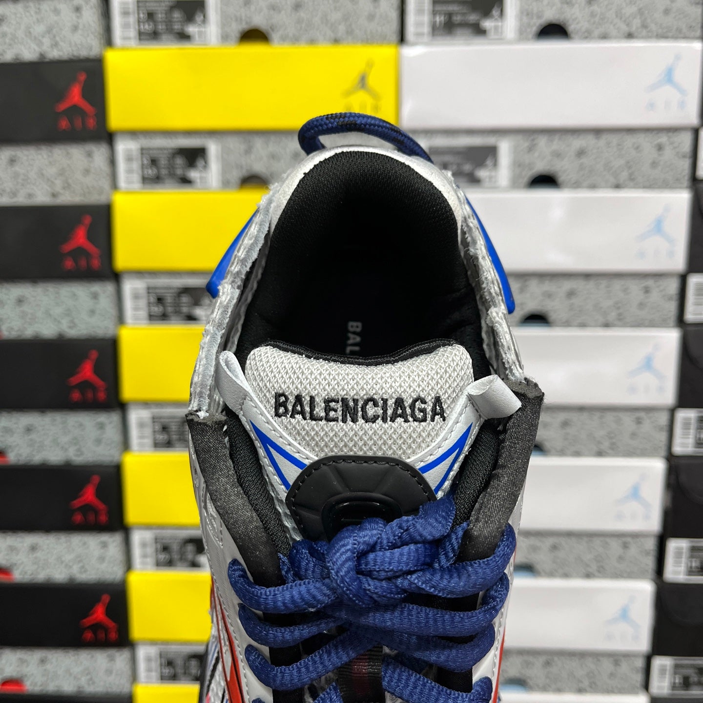 Unisex sneakers heel and collar, black lining with 'BALENCIAGA' detail and blue laces