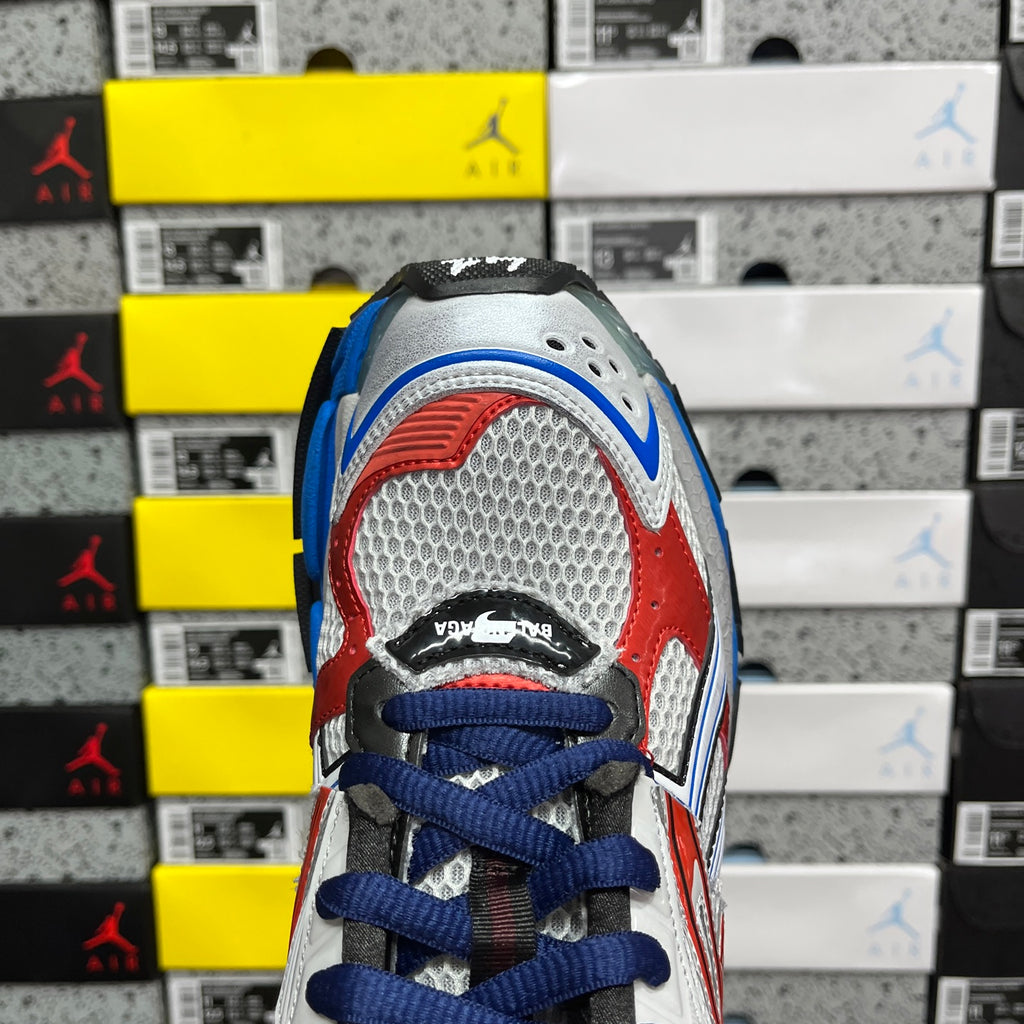 Unisex sneakers front view, white mesh and red panel with blue laces