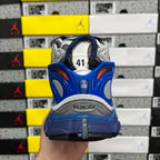 Unisex sneakers back view, blue heel cup and 'BALENCIAGA' logo on sole