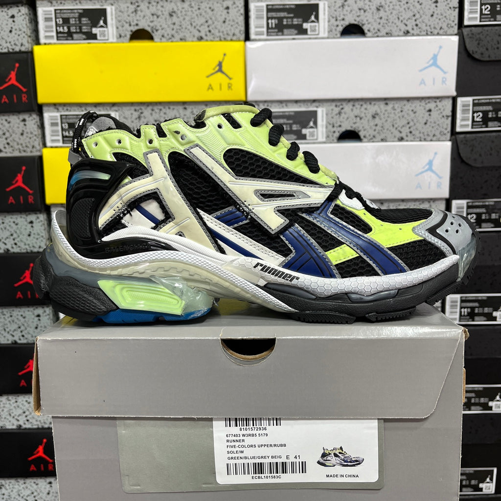 Balenciaga unisex running sneaker with neon green laces, black mesh, and blue stripes