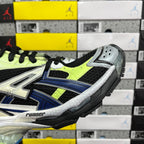 Balenciaga unisex running sneaker side profile in neon green, black, and white with blue trim