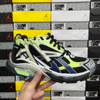 Balenciaga unisex running sneaker in neon green, black, and white with blue accents