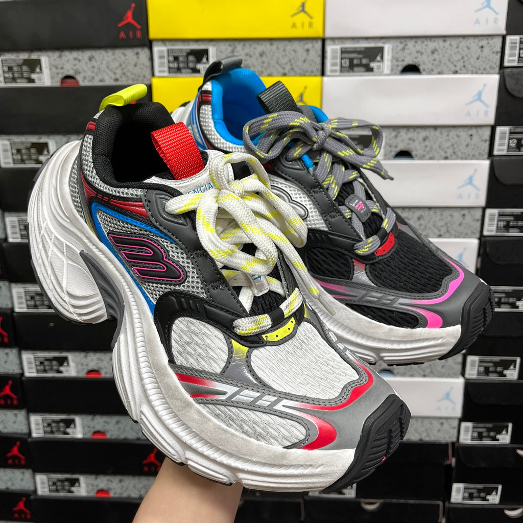Balenciaga unisex chunky sneaker, pair side view with black and blue panels