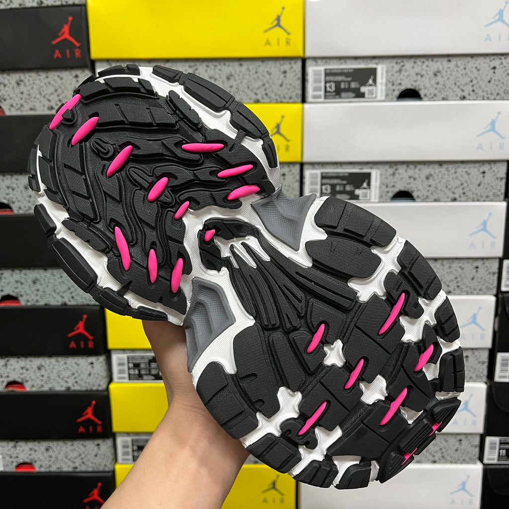 Balenciaga unisex chunky sneaker, outsole view with pink accents and deep tread