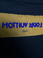 Louis Vuitton fabric label on black T-shirt interior neck hem