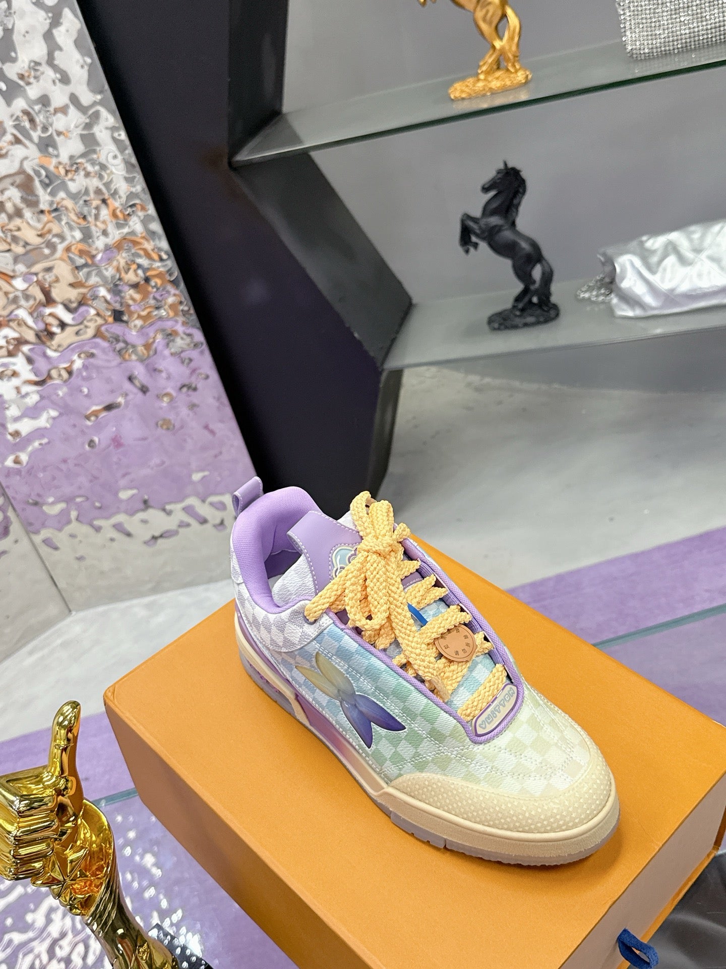 Louis Vuitton ladies sneakers with pastel checkered pattern, purple collar, and yellow laces