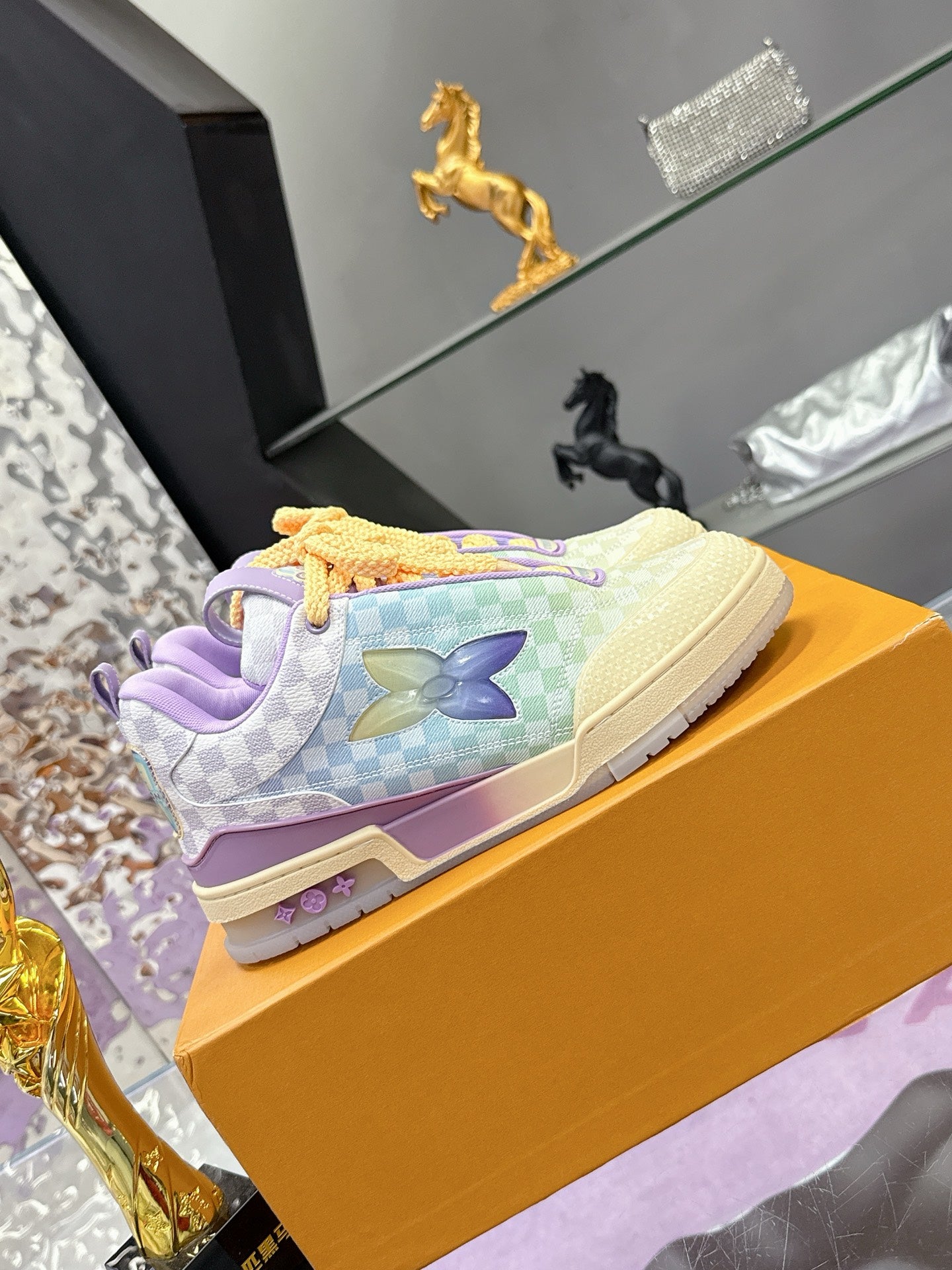 Louis Vuitton ladies sneakers with butterfly motif and pastel checkered canvas, yellow laces