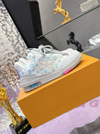 Louis Vuitton ladies low-top sneakers, white with multicolor logo print and pink heel trim