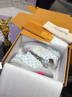 Louis Vuitton ladies sneakers, white with multicolor logo print and gray laces