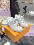 Louis Vuitton ladies sneakers on box, white with multicolor monogram pattern and laces