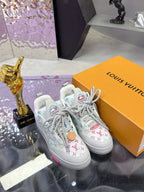 Louis Vuitton ladies sneakers, white with multicolor logo print and gray lace-up style