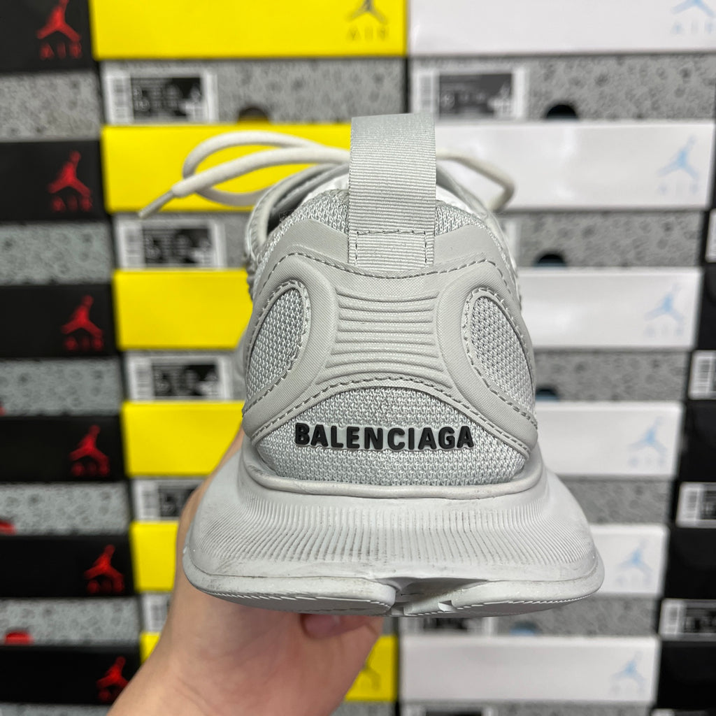 Light gray mesh Balenciaga sneaker heel with black text logo on back