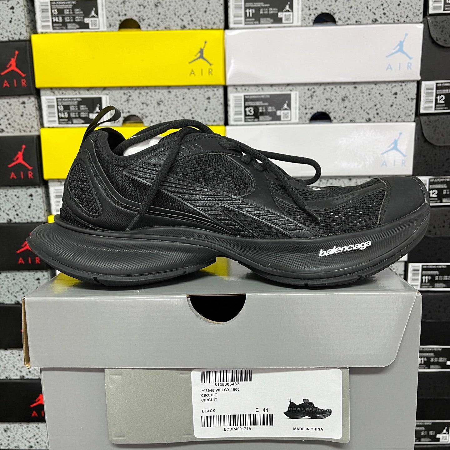 Black Balenciaga unisex sneaker, side view with lace-up mesh and ridged sole