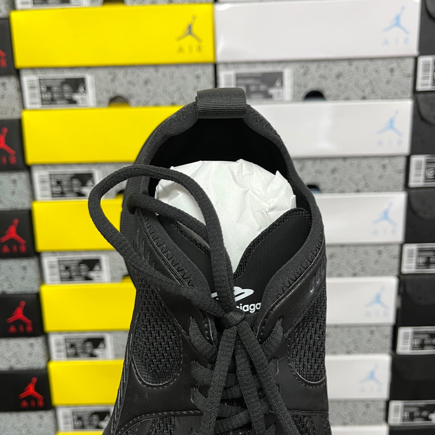 Black Balenciaga unisex sneaker, tongue and collar detail with lace-up