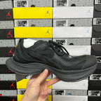 Black Balenciaga unisex sneaker, profile view with lace-up and cushioned midsole