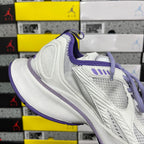 Unisex white sneaker with purple collar and textured side panel