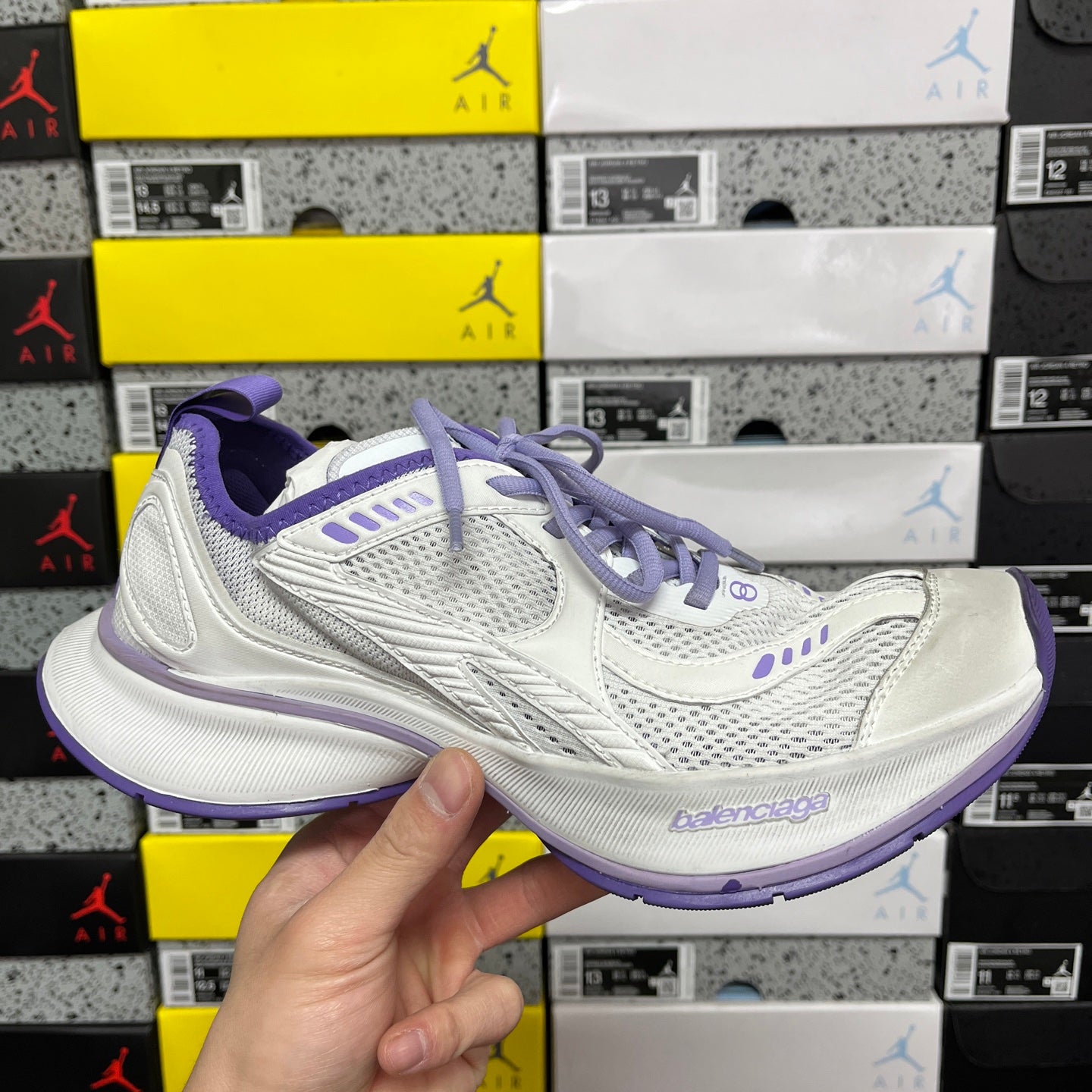 Unisex white sneaker with purple laces and side logo detail
