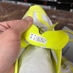 Lime green Balenciaga sneaker tongue tag with sizing label and 'Made in China'