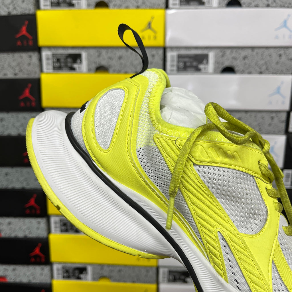Lime green and white Balenciaga sneaker with lace-up vamp and thick white midsole