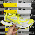 Lime green and white Balenciaga unisex sneaker with mesh panels and neon laces